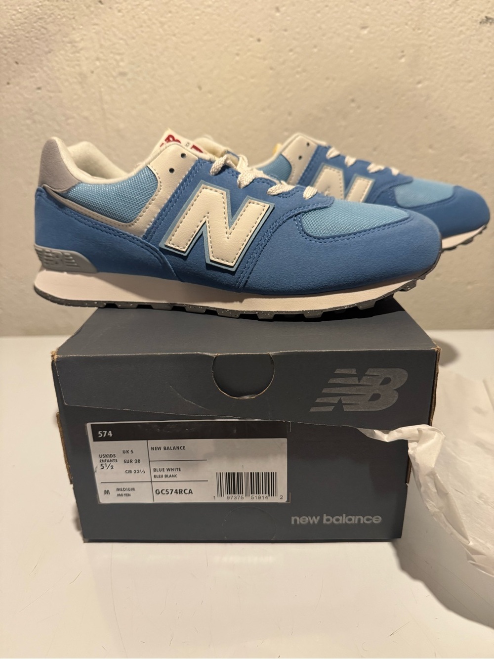 New Balance 574 Sneakers in Sky Blue and White